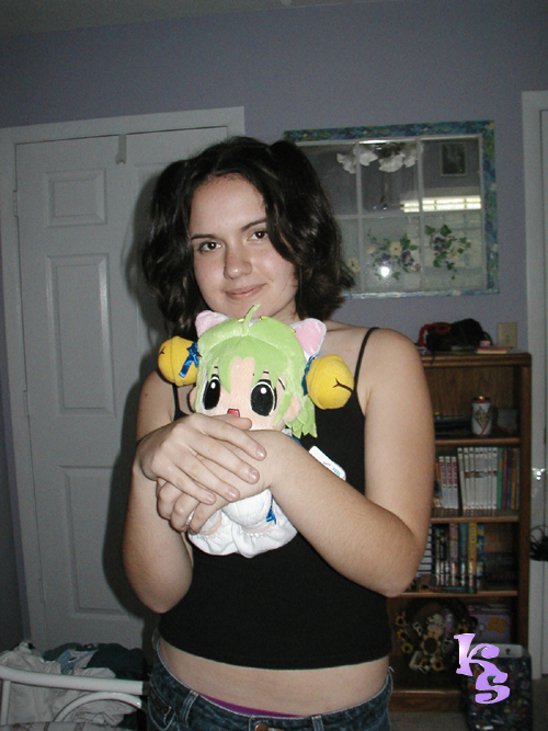 Lovin' on her Digiko plushie
